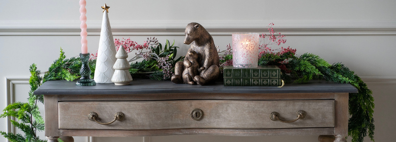 Christmas decorations on a hallway console table