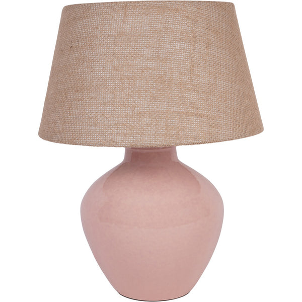 Small pink table lamp with a beige textured hessian shade on a white background