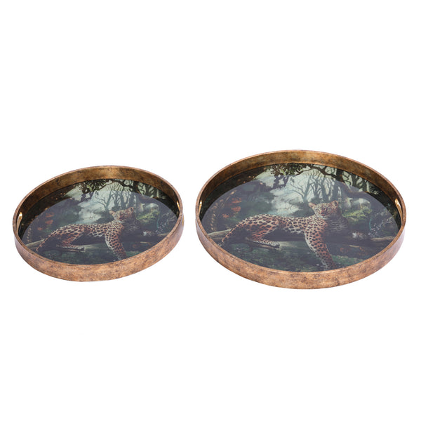 Two round decorative trays with a lounging leopard design, antique gold effect rims with two carry handles on a white background