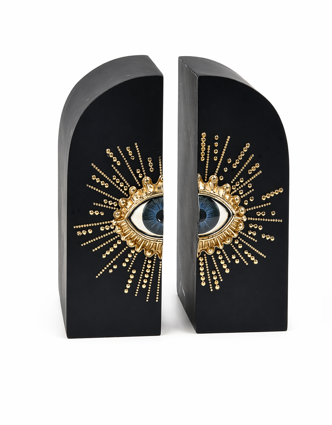 Black bookends with gold and blue eye design 