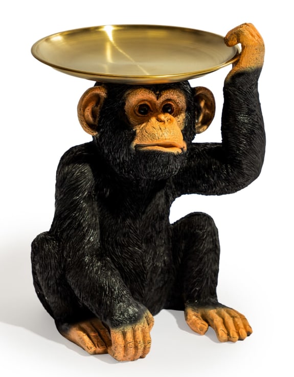 monkey ornament holding a god tray