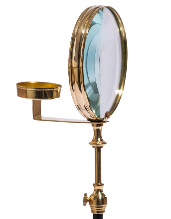 Brass Candle & Magnifying Glass on Black Stand