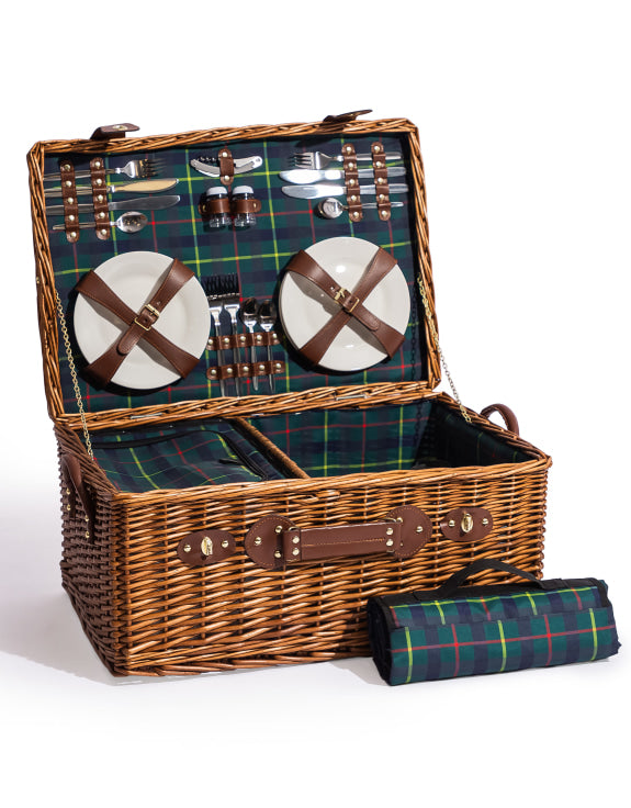 Luxury wicker picnic basket with tartan interior and accessories with a rolled up picnic blanket