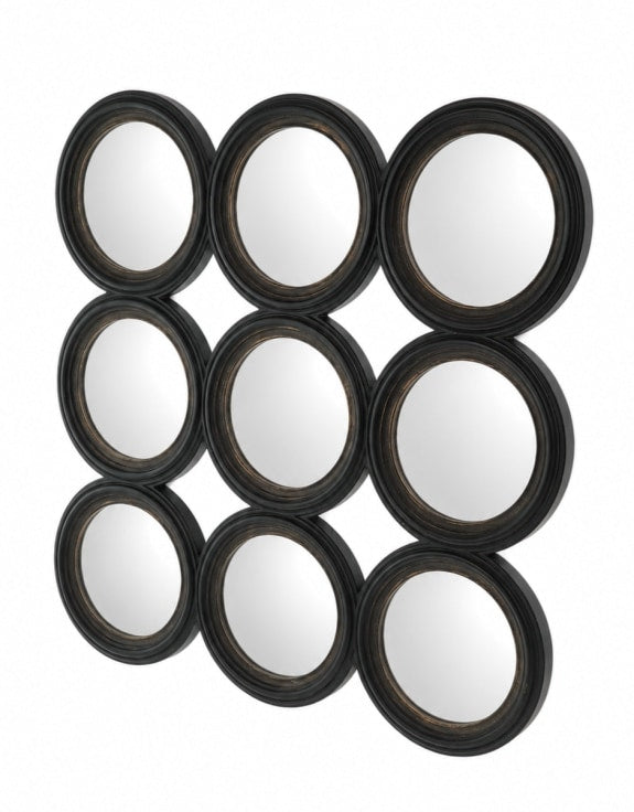 Nine circular mirrors with black frames arranged in a 3x3 grid 