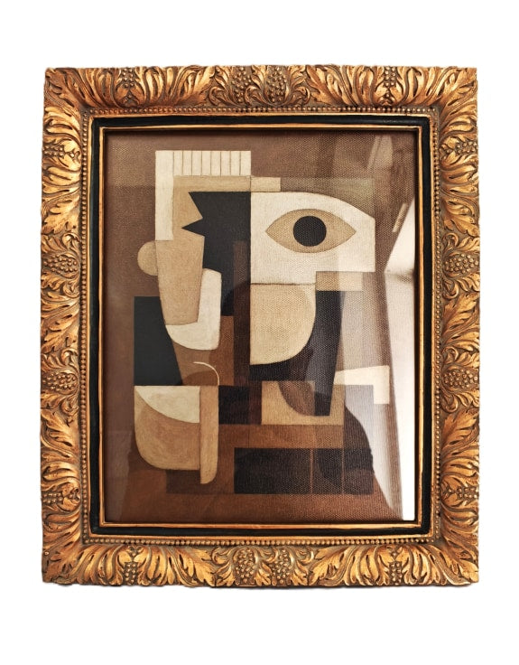 Abstract artwork in a gold frame 