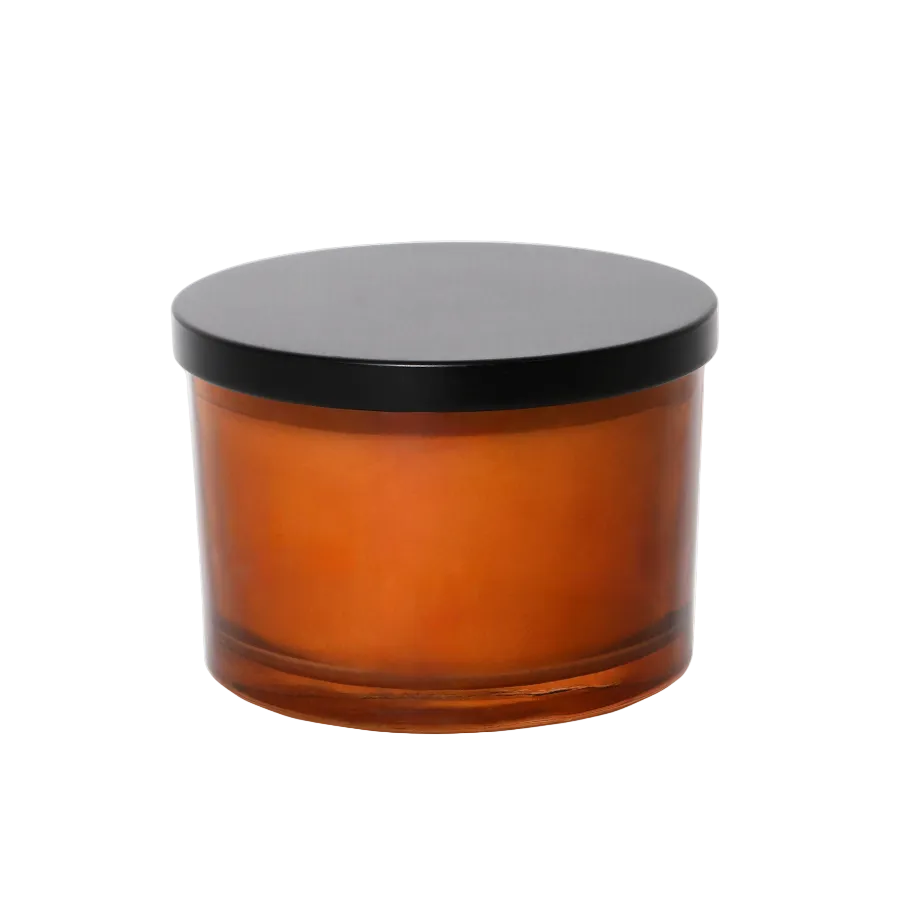 Amber glass candle with black lid 