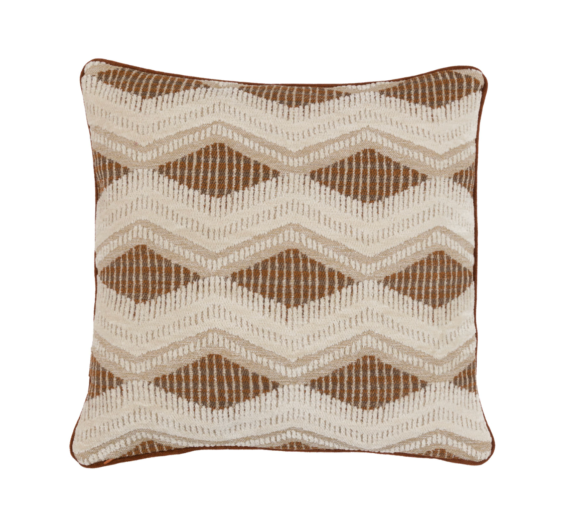 A square decorative throw pillow featuring a woven geometric pattern of brown and cream zigzags and diamonds.