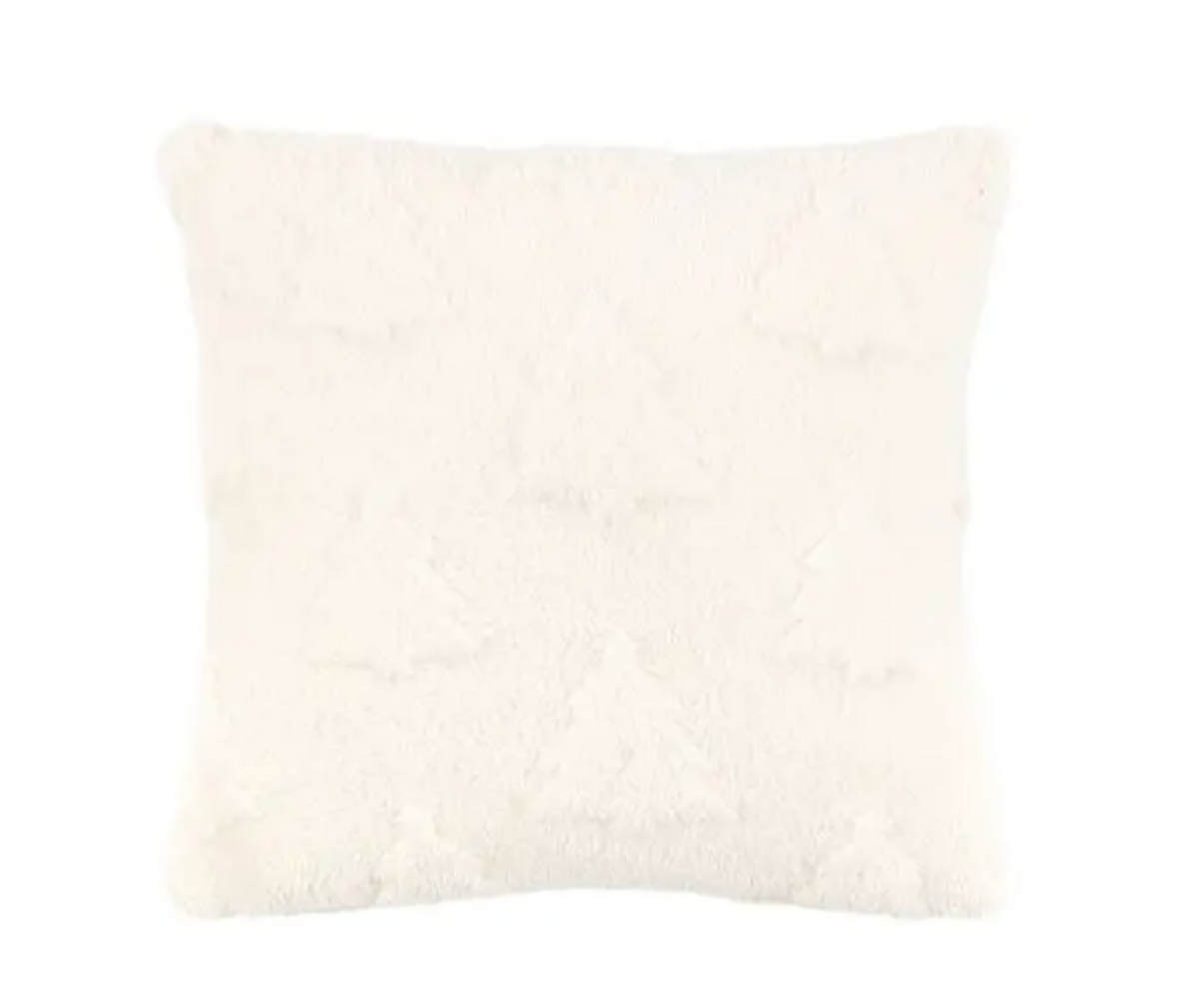 A square white faux fur throw pillow with  tree motifs on a soft, textured surface. 