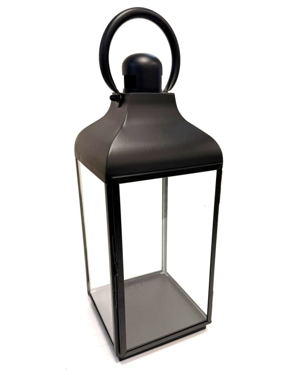 Black metal lantern with a handle