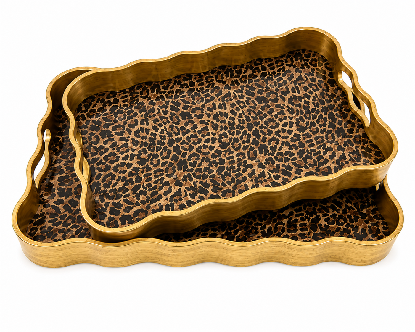 Two gold trays with a leopard print pattern 